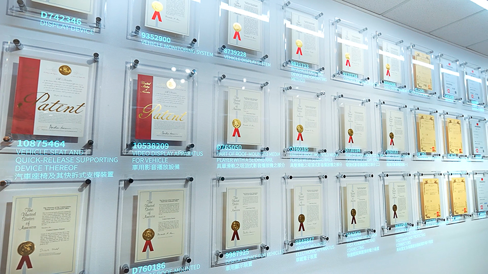 JET OPTO patent wall — granted patent certificates on display